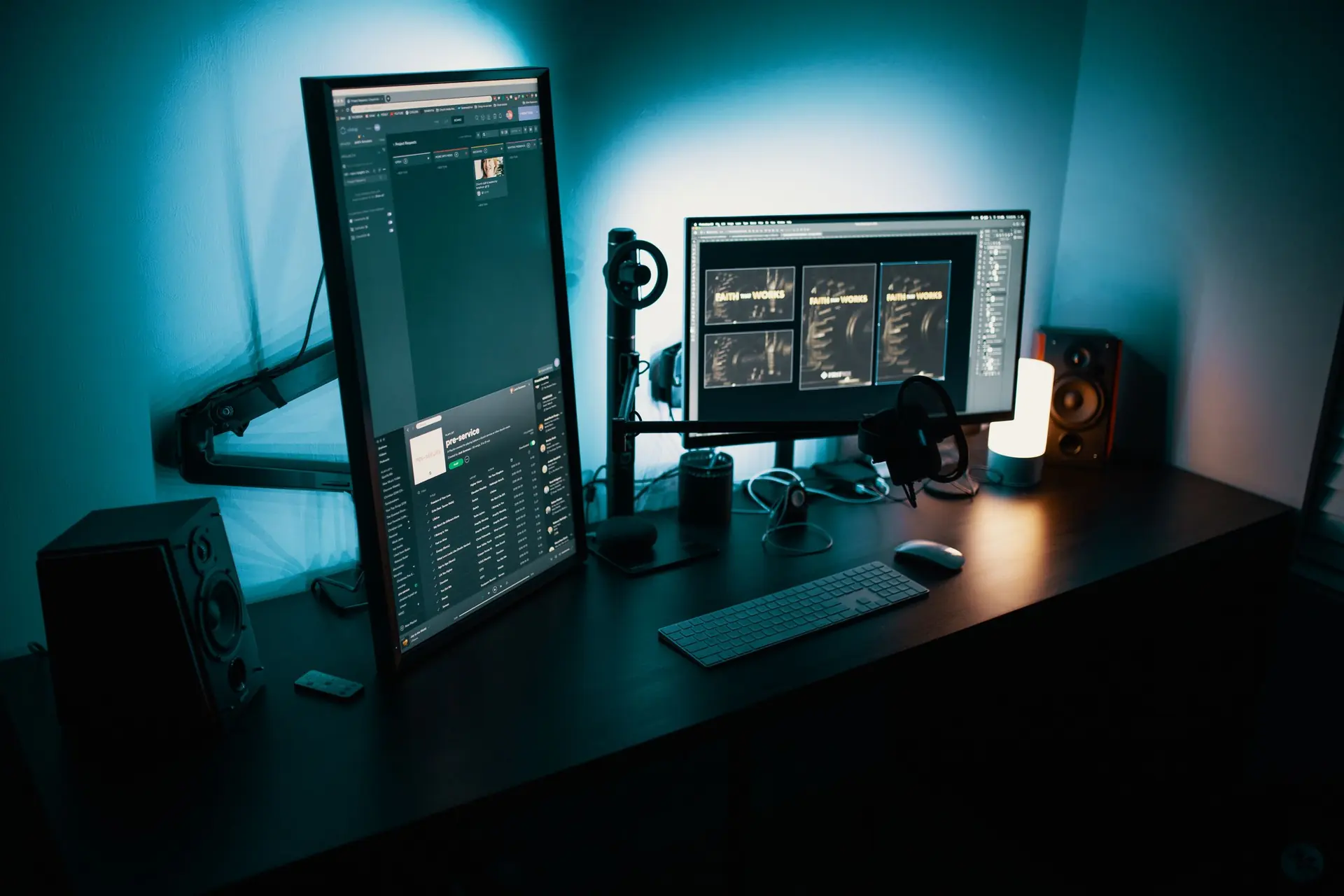 Desk with multiple monitors lit for security monitoring